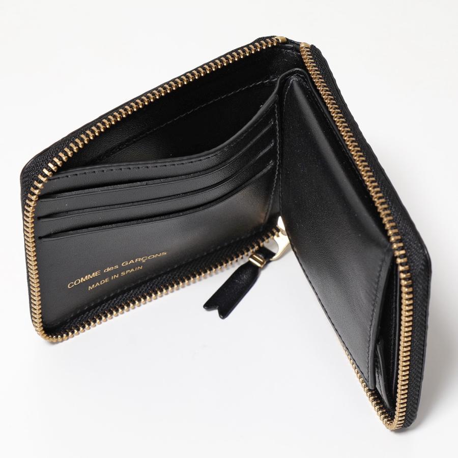 COMME des GARCONS コムデギャルソン 二つ折り財布 EMBOSSED