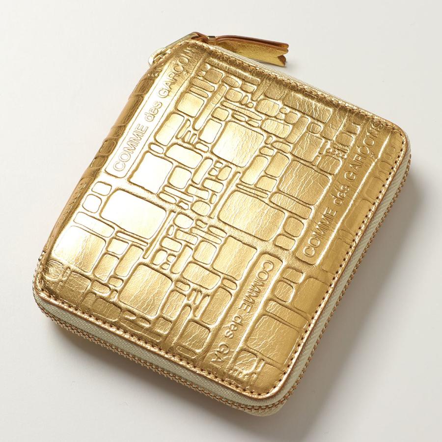 COMME des GARCONS コムデギャルソン 二つ折り財布 EMBOSSED COMME des GARCONS コムデギャルソン 二つ折り財布 EMBOSSED