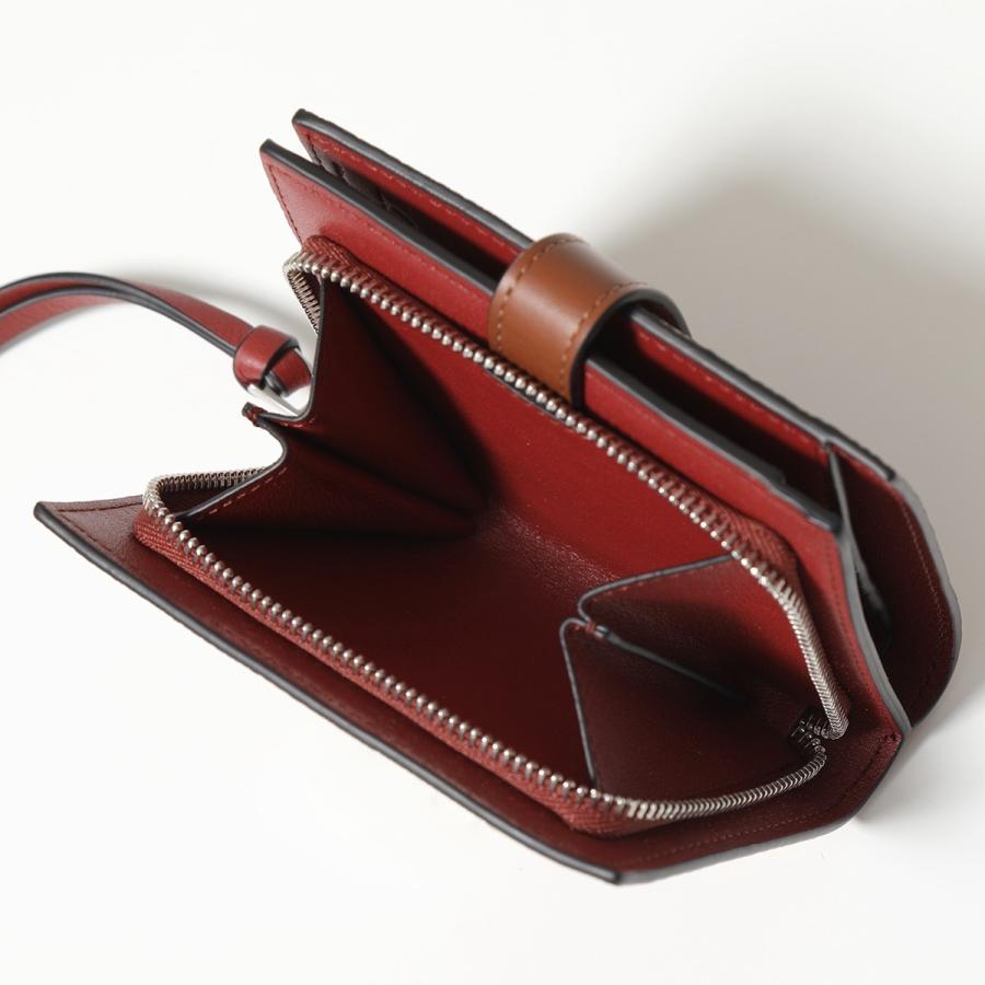 希少 LOEWE 二つ折り財布 パイソン柄 ジップ 刻印 スペイン製 レザー 希少 LOEWE 二つ折り財布 パイソン柄 ジップ 刻印 スペイン製 レザー