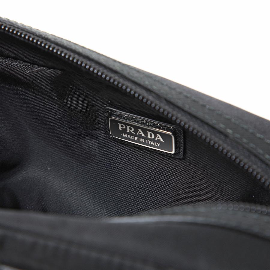 【未使用級】PRADA リナイロン　トラベルポーチ　トライアングルロゴ　黒 PRADA（プラダ） Re-Nylon Pouch リナイロン トライアングルロゴ