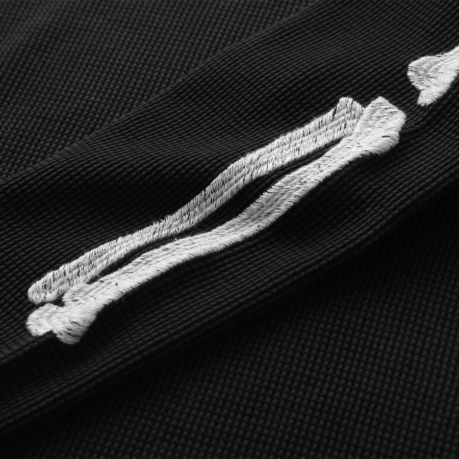 AMIRI アミリ カットソー AMTOJR1032 メンズ Tシャツ 長袖 ロンT ロゴT 刺繍 ボーンモチーフ ワッフルニットコットン ストレッチ クルーネック 001/Blackの画像