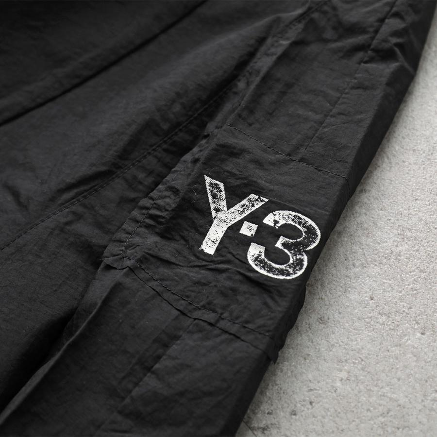 Y-3 ワイスリー ナイロンパンツ RAW EDGE 3 STRIPES NYLON SHELL PANTS KE6632 メンズ ルーズフィット 撥水 はっ水 軽量 セットアップ可能 BLACKの画像