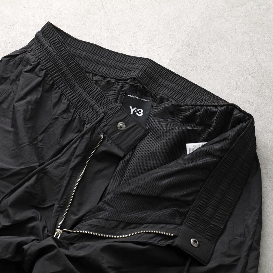 Y-3 ワイスリー ナイロンパンツ RAW EDGE 3 STRIPES NYLON SHELL PANTS KE6632 メンズ ルーズフィット 撥水 はっ水 軽量 セットアップ可能 BLACKの画像