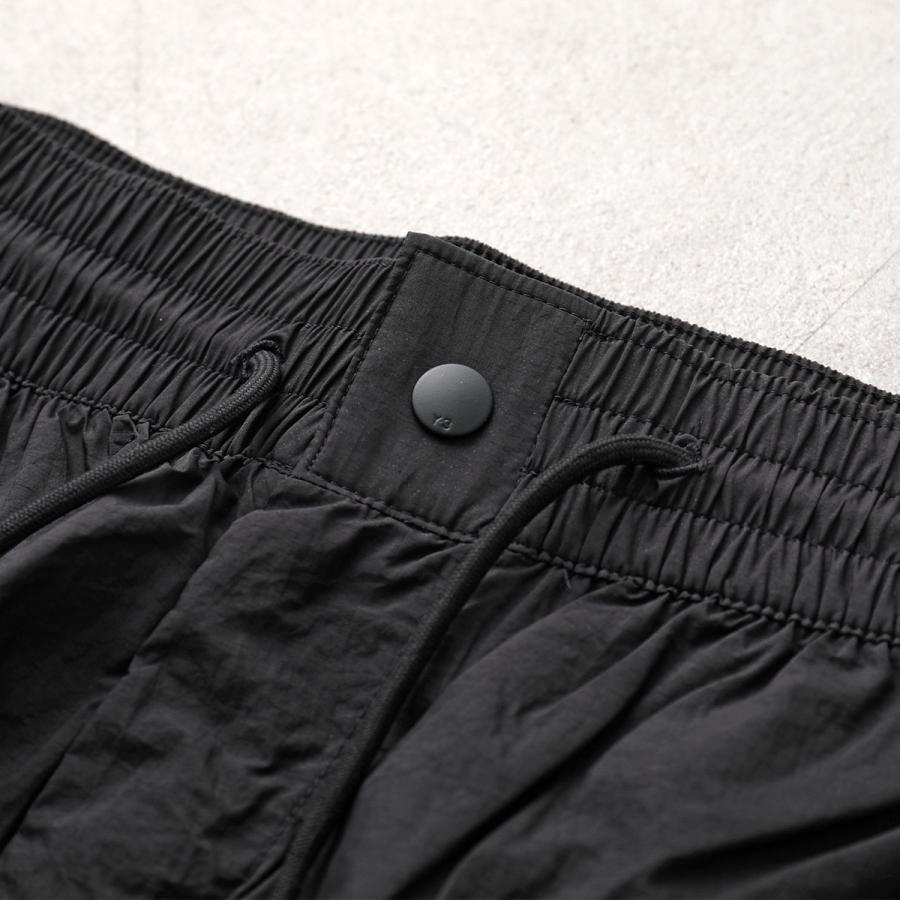 Y-3 ワイスリー ナイロンパンツ RAW EDGE 3 STRIPES NYLON SHELL PANTS KE6632 メンズ ルーズフィット 撥水 はっ水 軽量 セットアップ可能 BLACKの画像