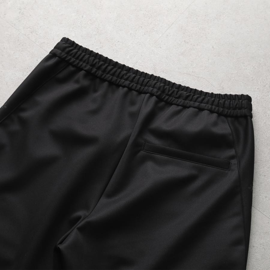 TATRAS タトラス イージーパンツ MENTORE メントーレ MCKZ0350103588 メンズ テーパード ロゴ ストレッチ ジャージ ブラックの画像