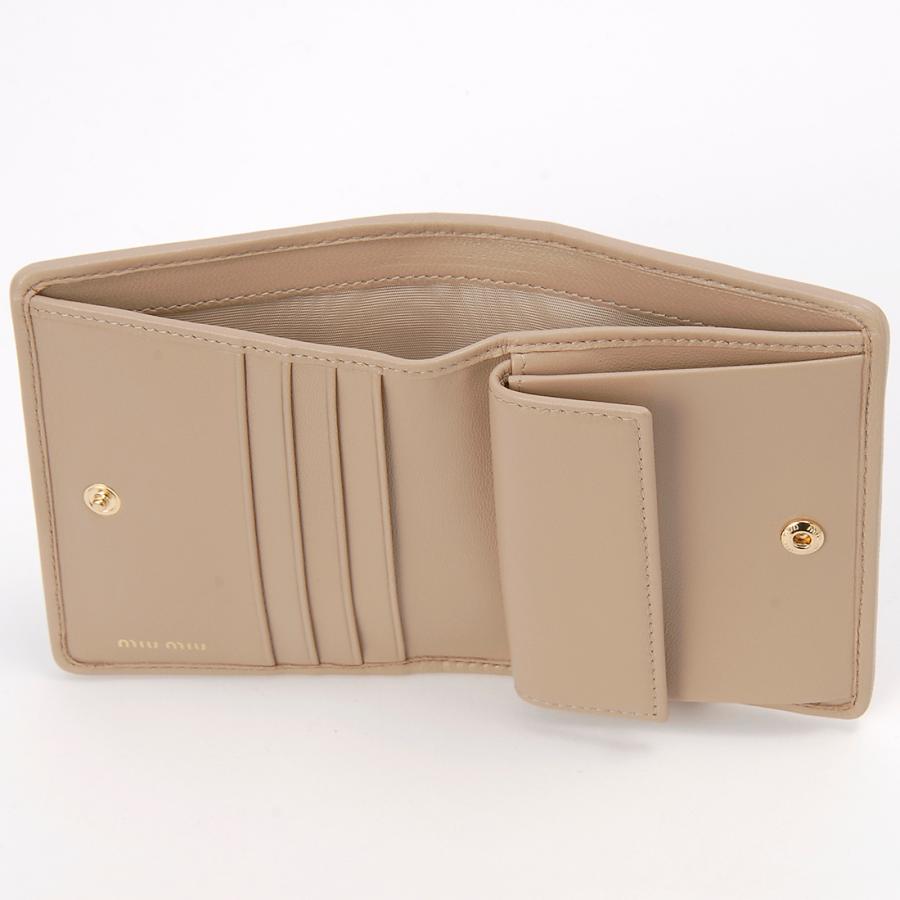 訳あり 側面に革はがれあり MIU MIU ミュウミュウ 二つ折り財布