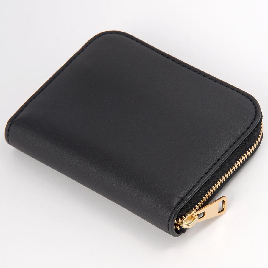 訳あり 背面に傷、汚れあり TORY BURCH トリーバーチ 二つ折り財布