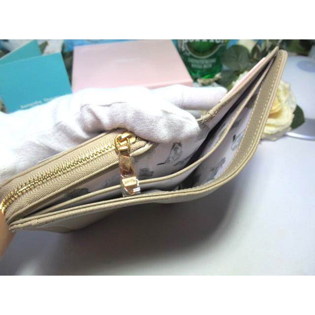 新品タグ付き★定価24840円 ツインキャット２つ折り財布 トッズ TOD'S XAWTSKBA200 KET 二つ折り財布 JASON CLOUD LUXOR