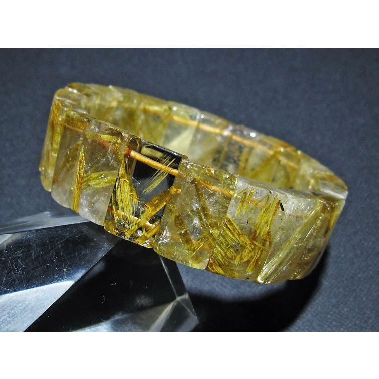 ルチルクォーツ バングル ゴールドタイチンルチル  t107-4527の画像