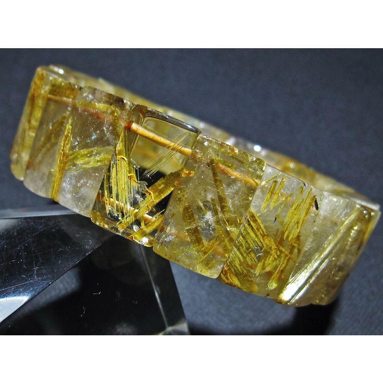 ルチルクォーツ バングル ゴールドタイチンルチル  t107-4527の画像