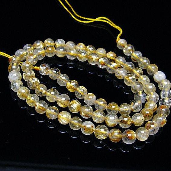 ルチルクォーツ 一連 ゴールドタイチンルチル 5mm t320-3886 : 誠安