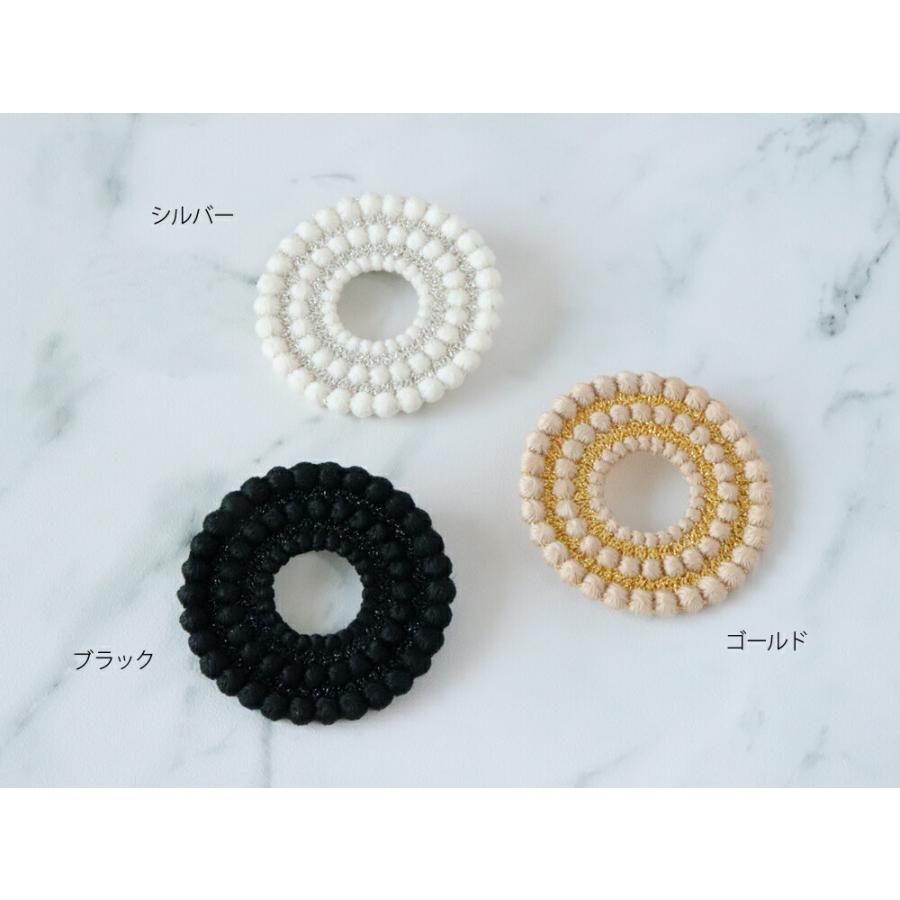 000 トリプル・オゥ ディスクブローチ TRIPLE O トリプルオゥ ゴールド シルバー ブラック |  | 01