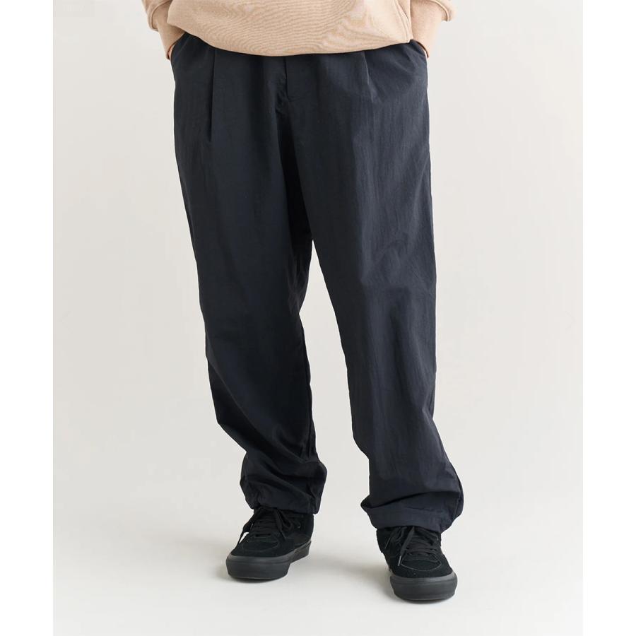 NANGA（ナンガ） NYLON TUSSER TRACK PANTS ナイロンタッサー トラック