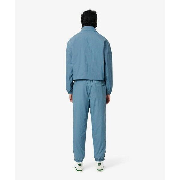 LACOSTE（ラコステ） ワッシャー加工 ナイロン 軽量撥水トラックパンツ