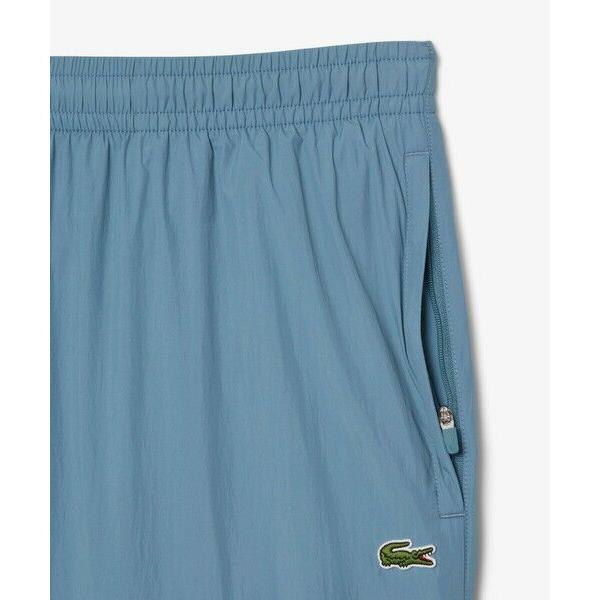 LACOSTE（ラコステ） ワッシャー加工 ナイロン 軽量撥水トラックパンツ