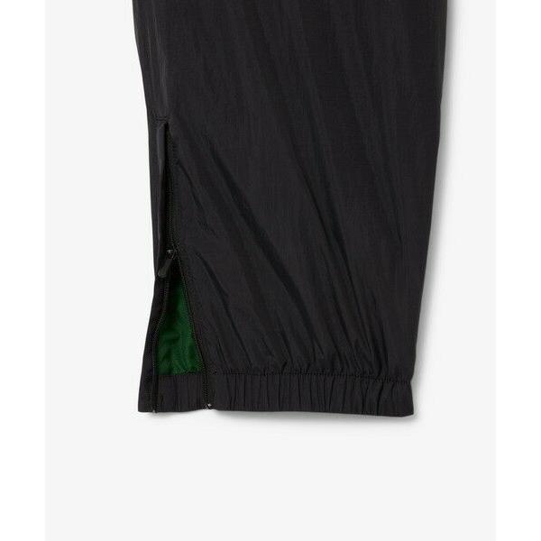 LACOSTE（ラコステ） ワッシャー加工 ナイロン 軽量撥水トラックパンツ