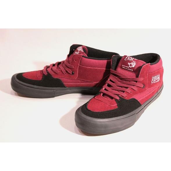 red and black low top vans