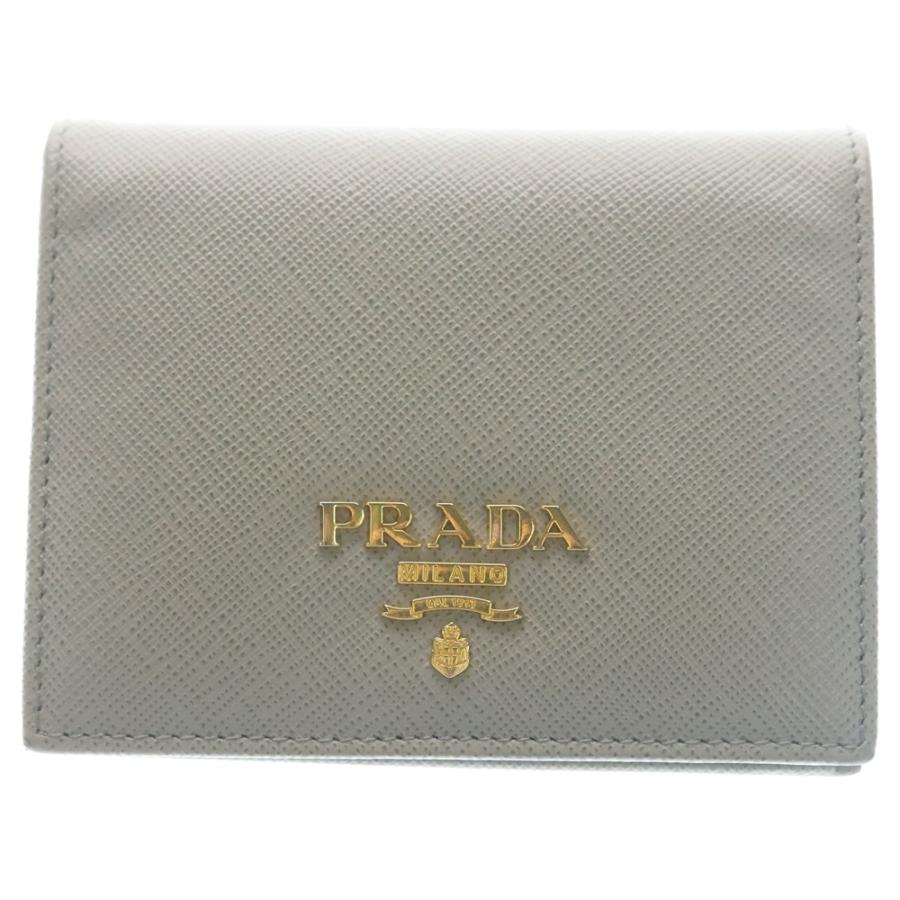 PRADA プラダ　折り財布　リボン　ゴールドロゴ ブルー　サフィアーノレザー プラダ PRADA 財布 レディース メンズ 長財布 新品 新作 二つ折り