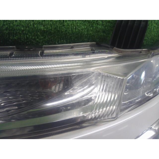 エルグランド DBA-PE52 左 ヘッド ランプ ライト QAB 100-23009 HID