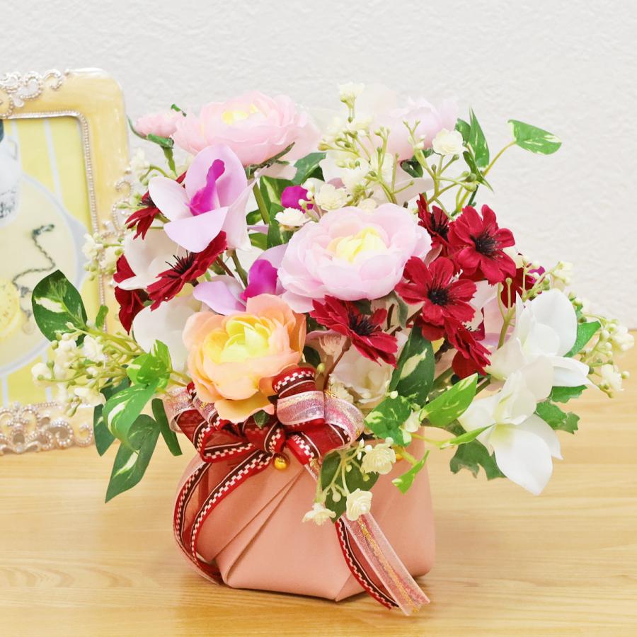 造花 オーキッドとコスモスなどの明るめのアレンジ こすもす 秋桜