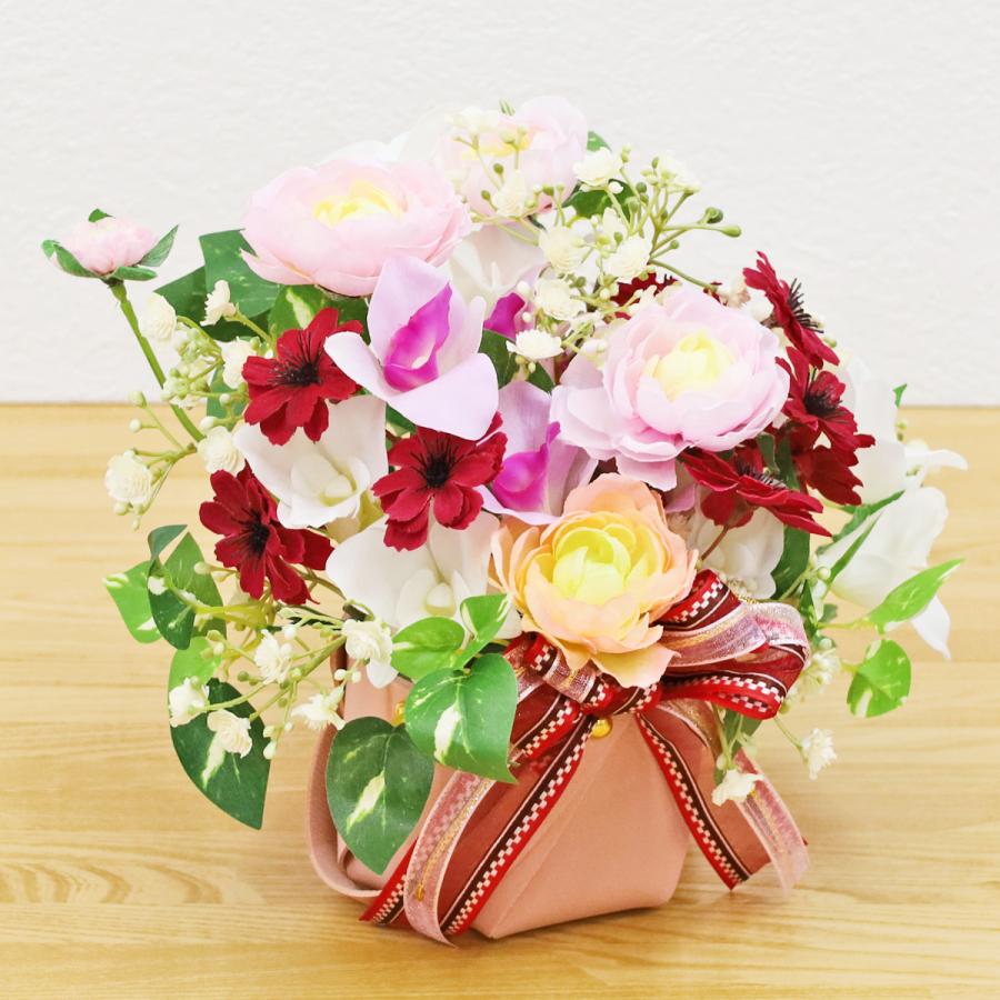 造花 オーキッドとコスモスなどの明るめのアレンジ こすもす 秋桜