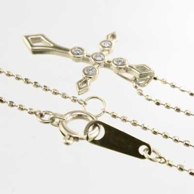 天然ダイヤ 4月誕生石 k10イエローゴールド ペンダント ファイブストーン クロス 約0.07カラットの画像