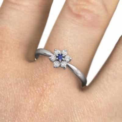 フラワー 18金ホワイトゴールド 9月の誕生石 天然ダイヤモンド リング サファイヤの画像