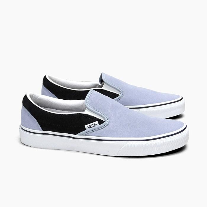 blue and black vans slip ons