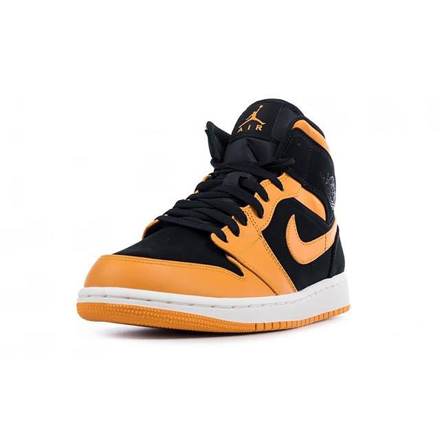 jordan 1 mid black orange peel