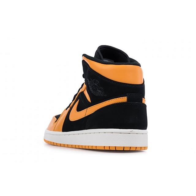 jordan 1 mid black orange peel
