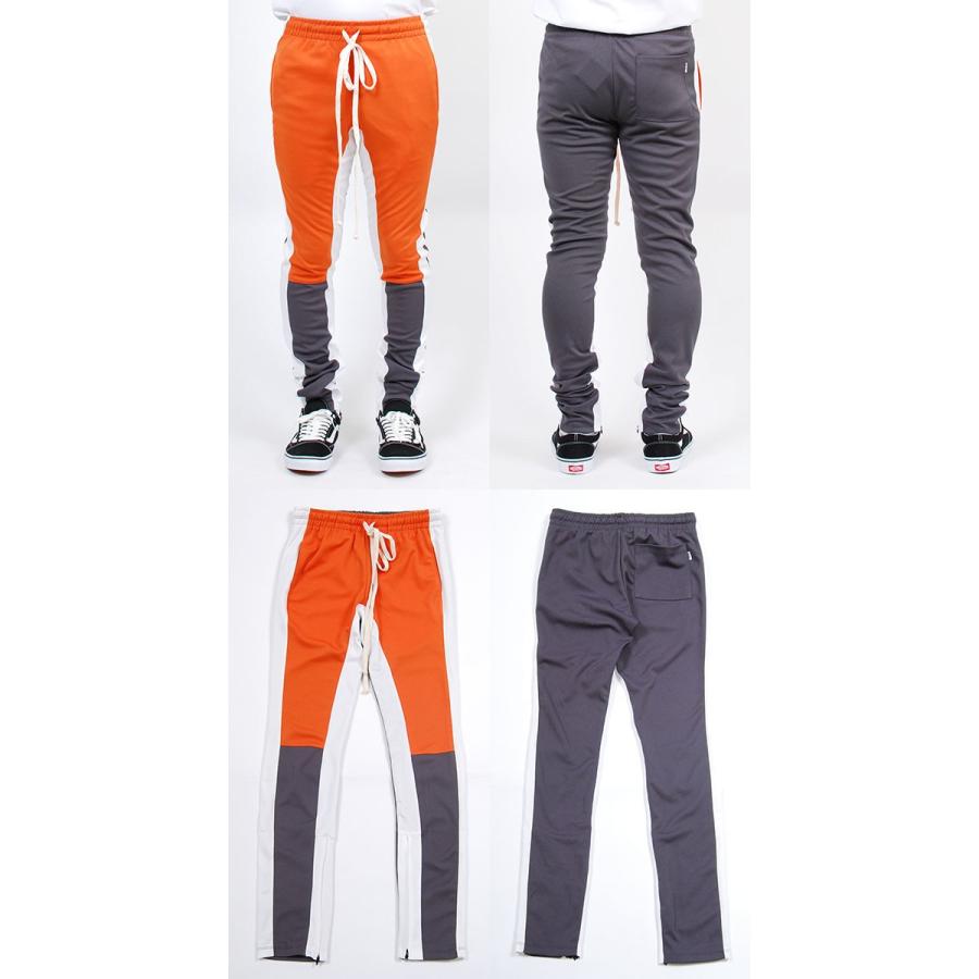 orange and white track pants