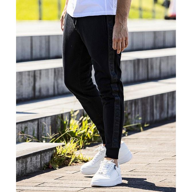 ［美品］1piu1uguale3 ロゴテープ　ストレッチジャージ　セットアップ 美品］1piu1uguale3 ロゴテープ ストレッチジャージ セットアップ