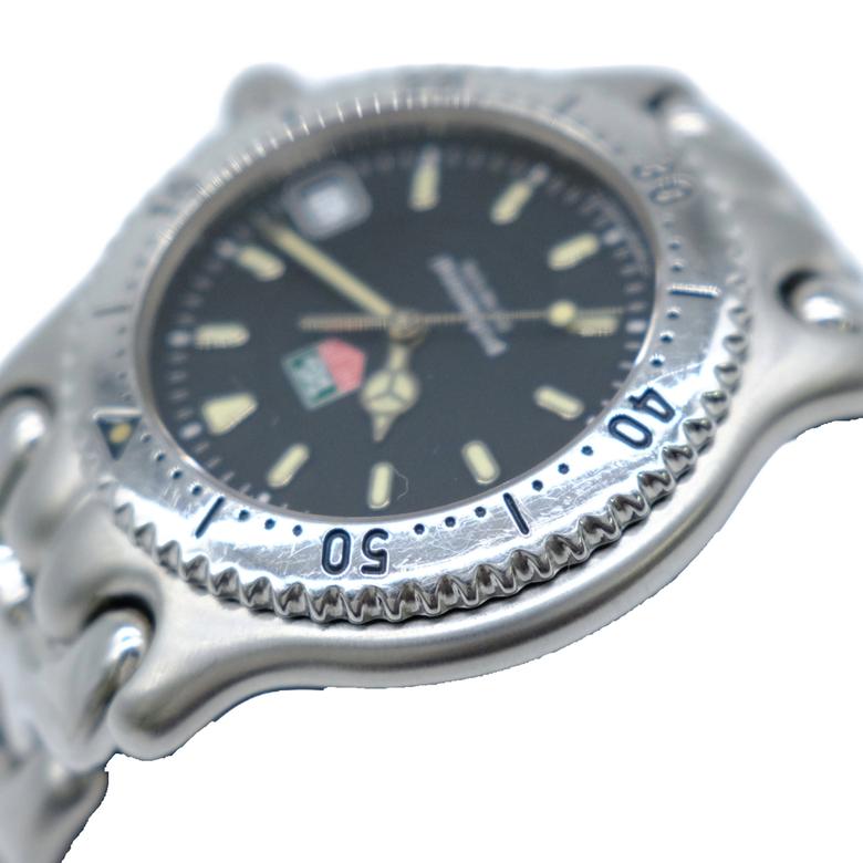 TAG HEUER タグホイヤー セルシリーズ 腕時計 ウォッチ シルバー ステンレススチール 黒文字盤 Q2 クォーツ WG1114-0 |  | 03