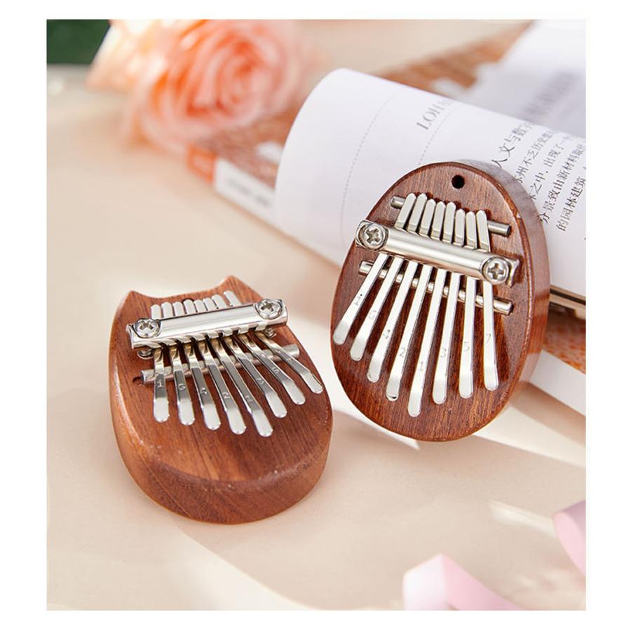 カリンバ ゆびピアノ ミニ 8キー Kalimba 操作簡単 初心者向け 子供用 ピアノ サムピアノ キッズ プレゼント ギフト 新年 クリスマスプレゼント 送料無料 |  | 01