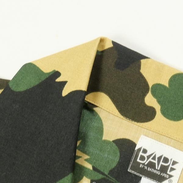 ア ベイシング エイプ A BATHING APE ×KAWS 1stサル迷彩柄半袖シャツ