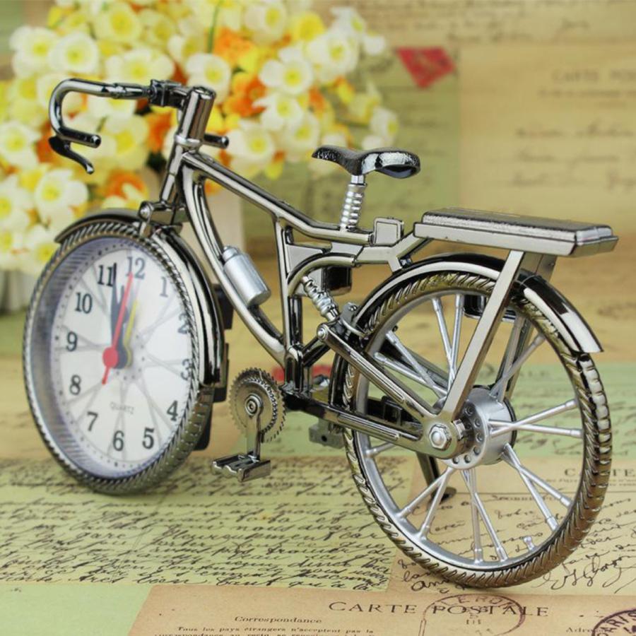 レトロな自転車の目覚まし時計.アラビア数字.自転車の形.目覚まし時計
