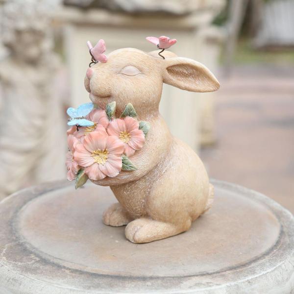 イースターバニーウサギの像ホーム春の置物の装飾は花を保持します