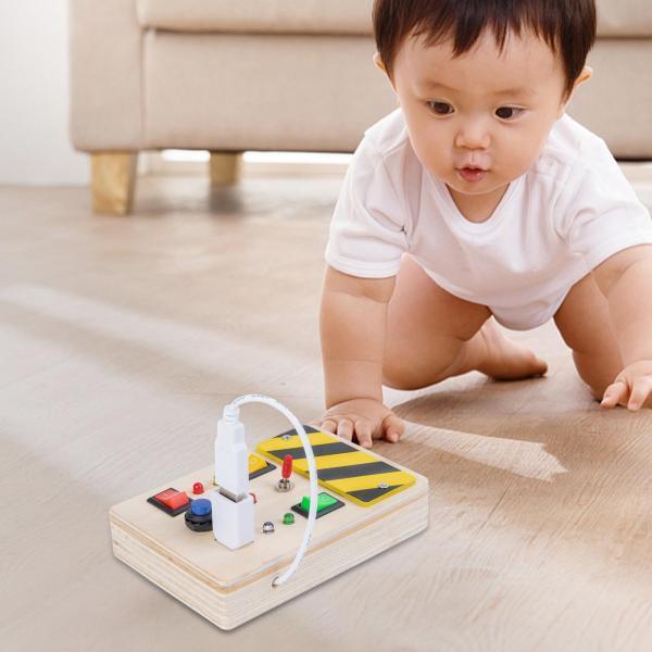 赤ちゃんの活動ボードプラグソケット電気スイッチおもちゃ初期の知育