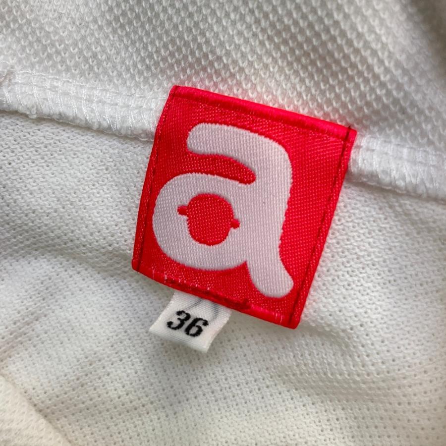 サイズ：36 ARCHIVIO アルチビオ  ノースリーブ襟付きTシャツ ストーンロゴ ホワイト系 [240001223639] ゴルフウェア レディース ストスト ARCHIVIO アルチビオ ノースリーブ襟付きTシャツ ストーンロゴ
