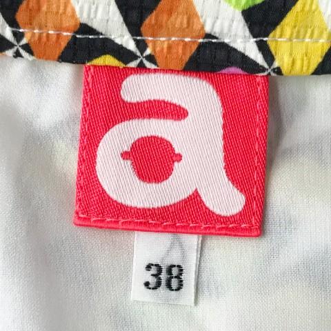 archivio（アルチビオ） 裏地付プリーツスカート プリズム柄 イエロー