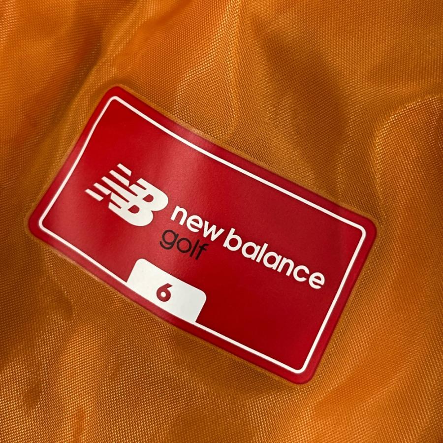 ニューバランスゴルフ 中綿 ベスト オレンジ 総柄 n NEW BALANCE GOLF ニューバランス 中綿切替 ジップベスト ロゴ柄