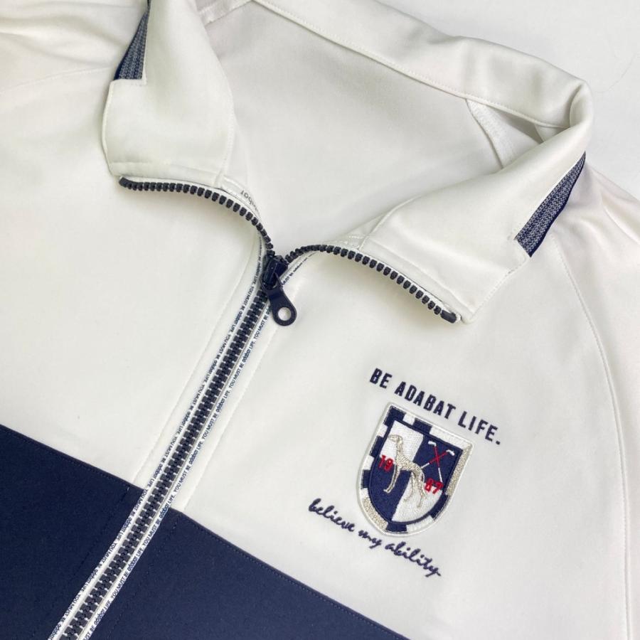 サイズ：48 ADABAT アダバット  ジップジャケット ボーダー柄 ネイビー系 [240101492418] ゴルフウェア メンズ ストスト サイズ：48 ADABAT アダバット ジップジャケット ボーダー柄