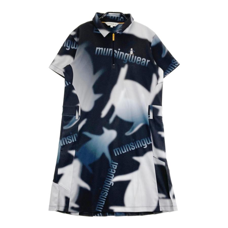 サイズ：L MUNSING WEAR マンシングウェア 2024年 ハーフジップ ワンピース 総柄 ブラック系 [240101415676] ゴルフウェア レディース ストスト Munsingwear MUNSING WEAR マンシングウェア 2024年 ハーフ