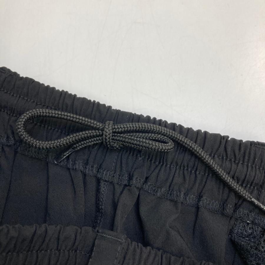 サイズ：XL MUNSING WEAR マンシングウェア 2024年モデル ナイロン パンツ  ブラック系 [240101433292] ゴルフウェア メンズ ストスト MUNSING WEAR マンシングウェア 2024年モデル ナイロン パンツ