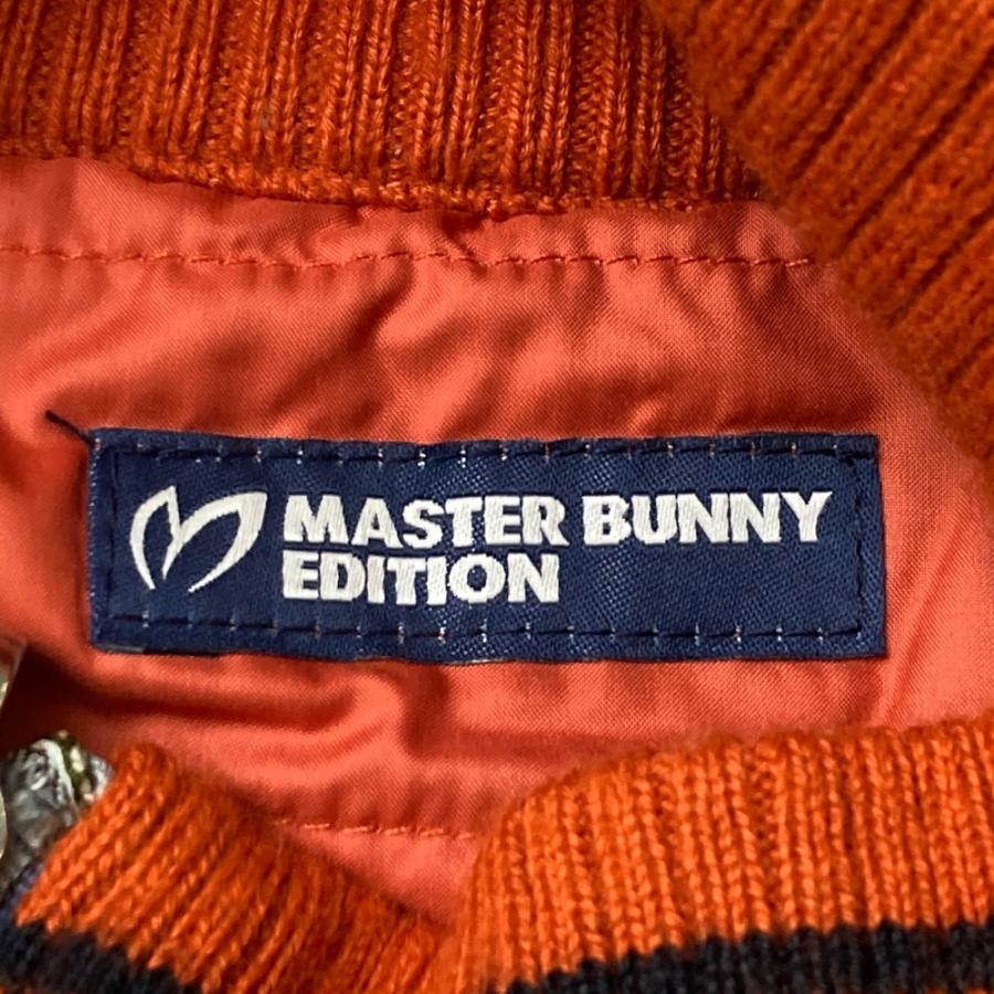 サイズ：4 MASTER BUNNY EDITION マスターバニーエディション  リバーシブル 中綿ニット切替 ジップベスト  オレンジ系 [240101466587] ゴルフウェア メンズ ストスト MASTER BUNNY EDITION マスターバニーエディション リバーシブル 中綿