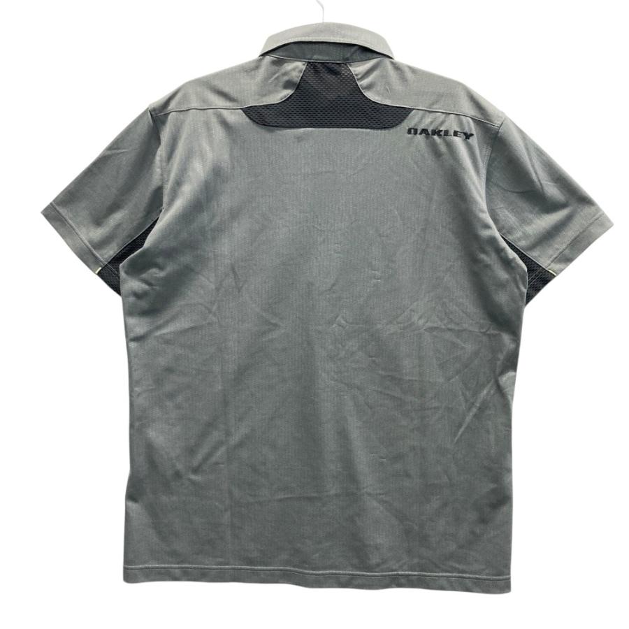 OAKLEY（オークリー） 433047JP 半袖ポロシャツ ボタンダウン 総柄