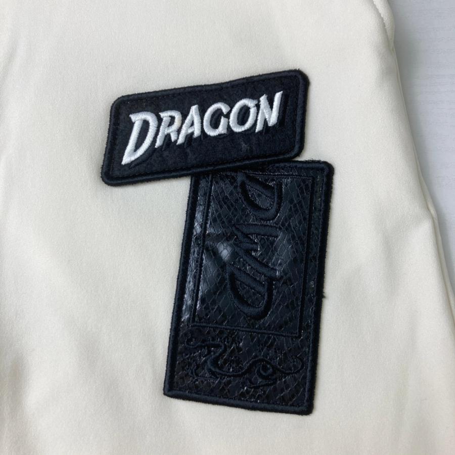 サイズ：2 DANCE WITH DRAGON ダンスウィズドラゴン  裏起毛 ストレッチパンツ ワッペン  ホワイト系 [240101568950] ゴルフウェア メンズ ストスト DANCE WITH DRAGON ダンスウィズドラゴン 裏起毛 ストレッチパンツ