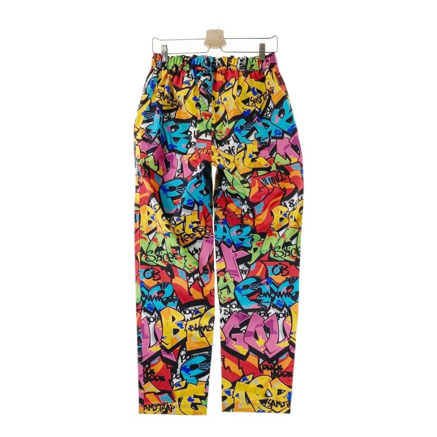 サイズ：M LOUD MOUTH ラウドマウス 763330 レインパンツ タグス 総柄 イエロー系 [240101638401] ゴルフウェア メンズ ストスト 新品】LOUD MOUTH ラウドマウス 763330 レインパンツ タグス 総柄