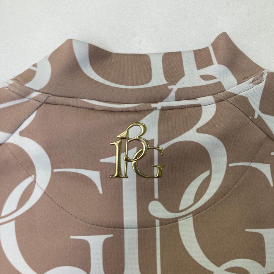 1PIU1UGUALE3 GOLF GRT148 ハイネック 長袖Tシャツ ロゴ総柄 ブラウン