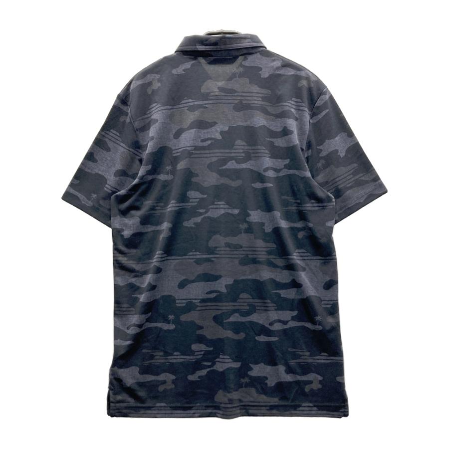 サイズ：XL TRAVIS MATHEW トラビスマシュー  半袖ポロシャツ 総柄 ブラック系 [240101424187] ゴルフウェア メンズ ストスト TRAVISMATHEW トラビスマシュー 半袖ポロシャツ 総柄 ブラック系 L